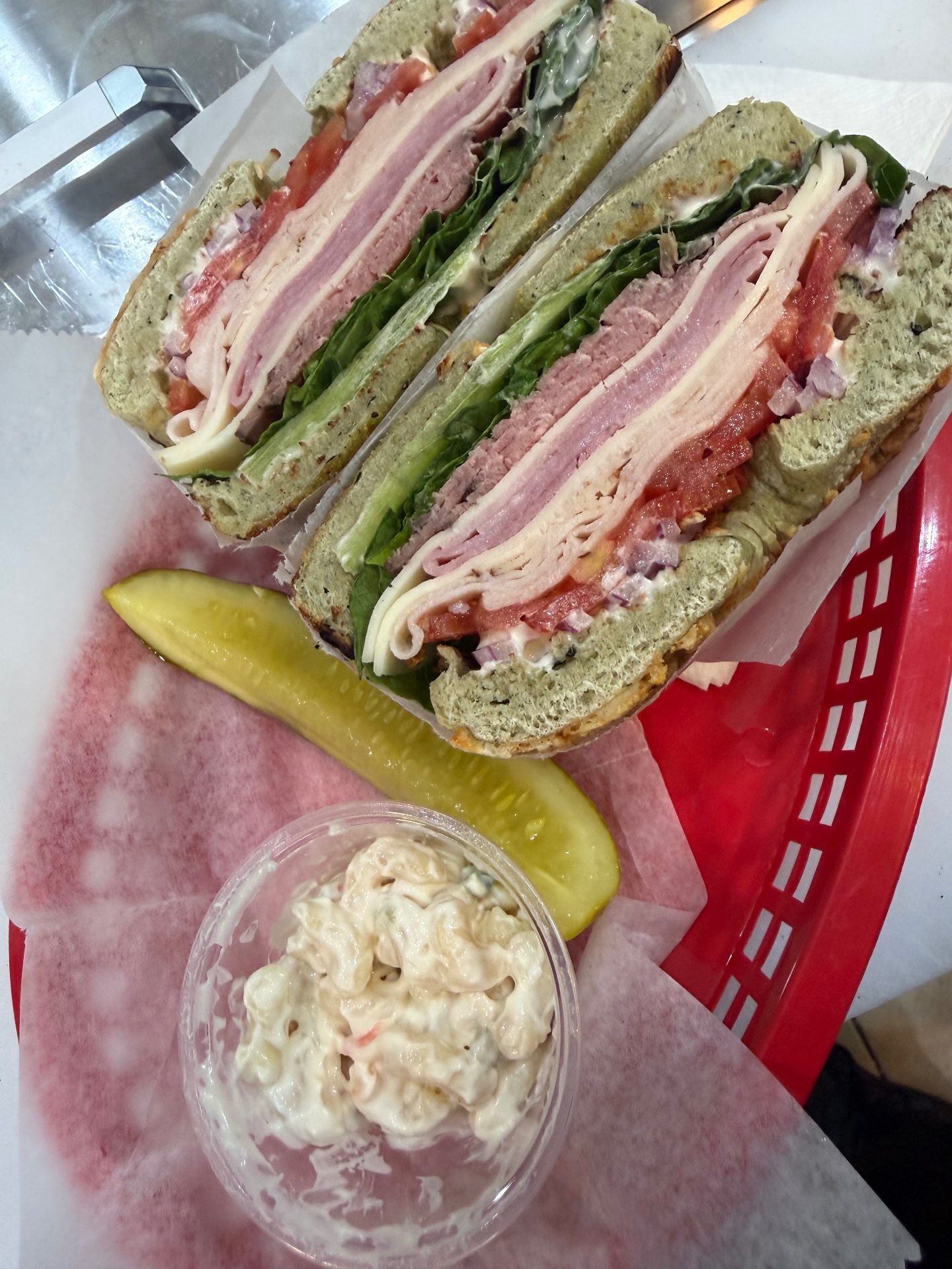 The Ultimate sandwich from Breakfast Bros stacked with ham, turkey, roast beef and provolone